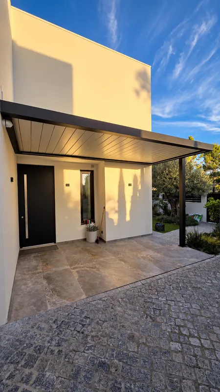 Aluminium pergola over a house entrance